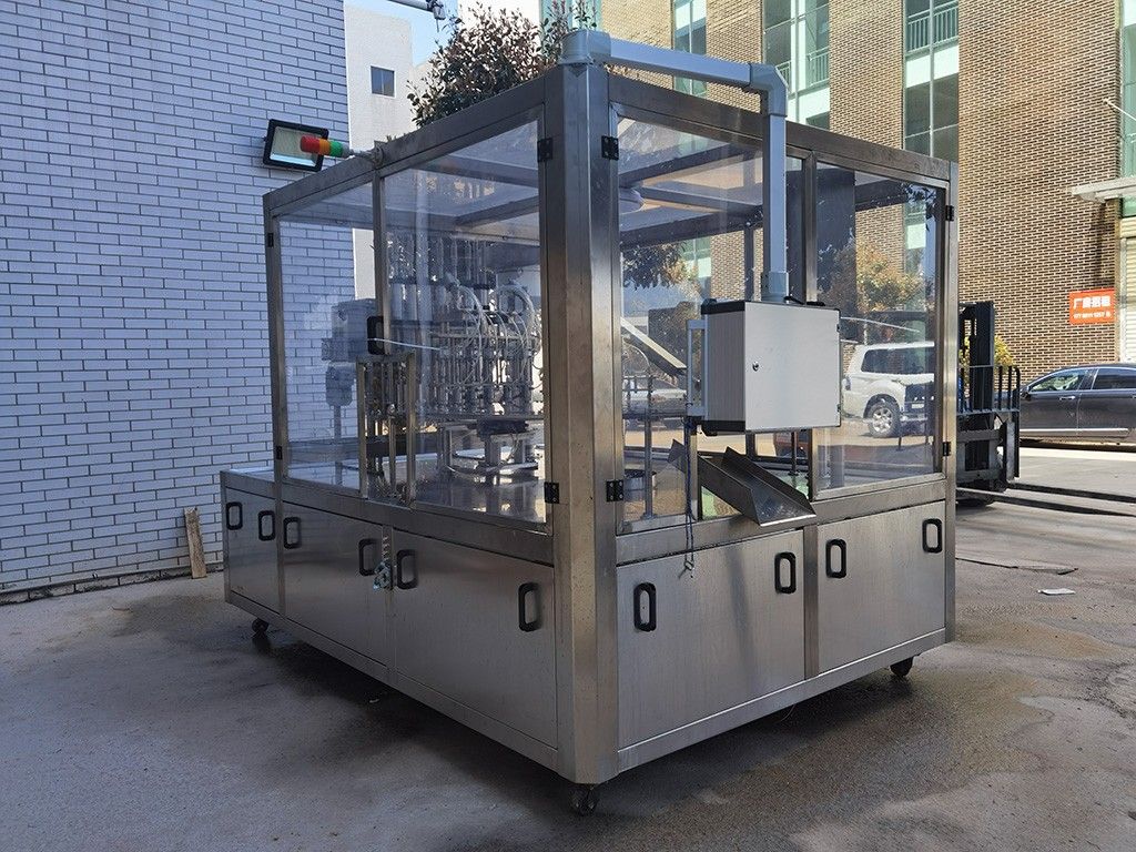 1765004582981630.jpg LG-620 斜嘴袋灌裝旋蓋機(小).jpg